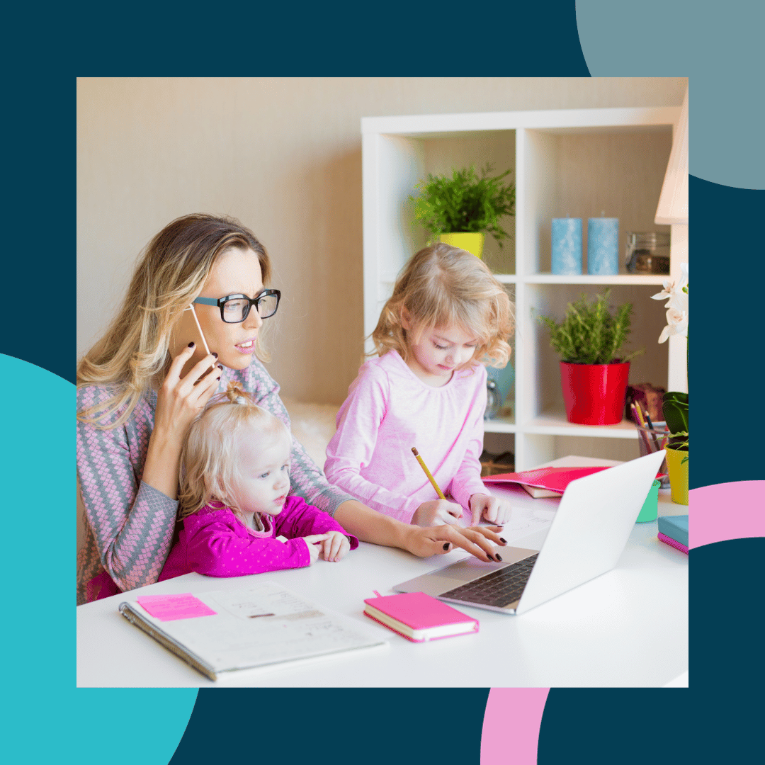 momsforiowa.info homepage image with a white woman on the phone at a computer surrounded by two small daughters